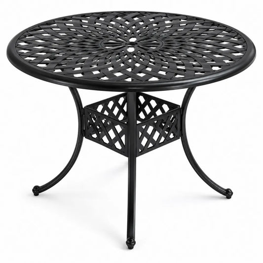 Table ronde en métal noir avec motifs ajourés pour extérieur